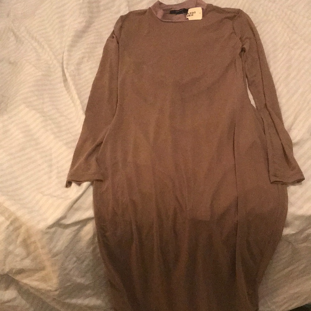 Long sleeve mesh dress with bodysuit.